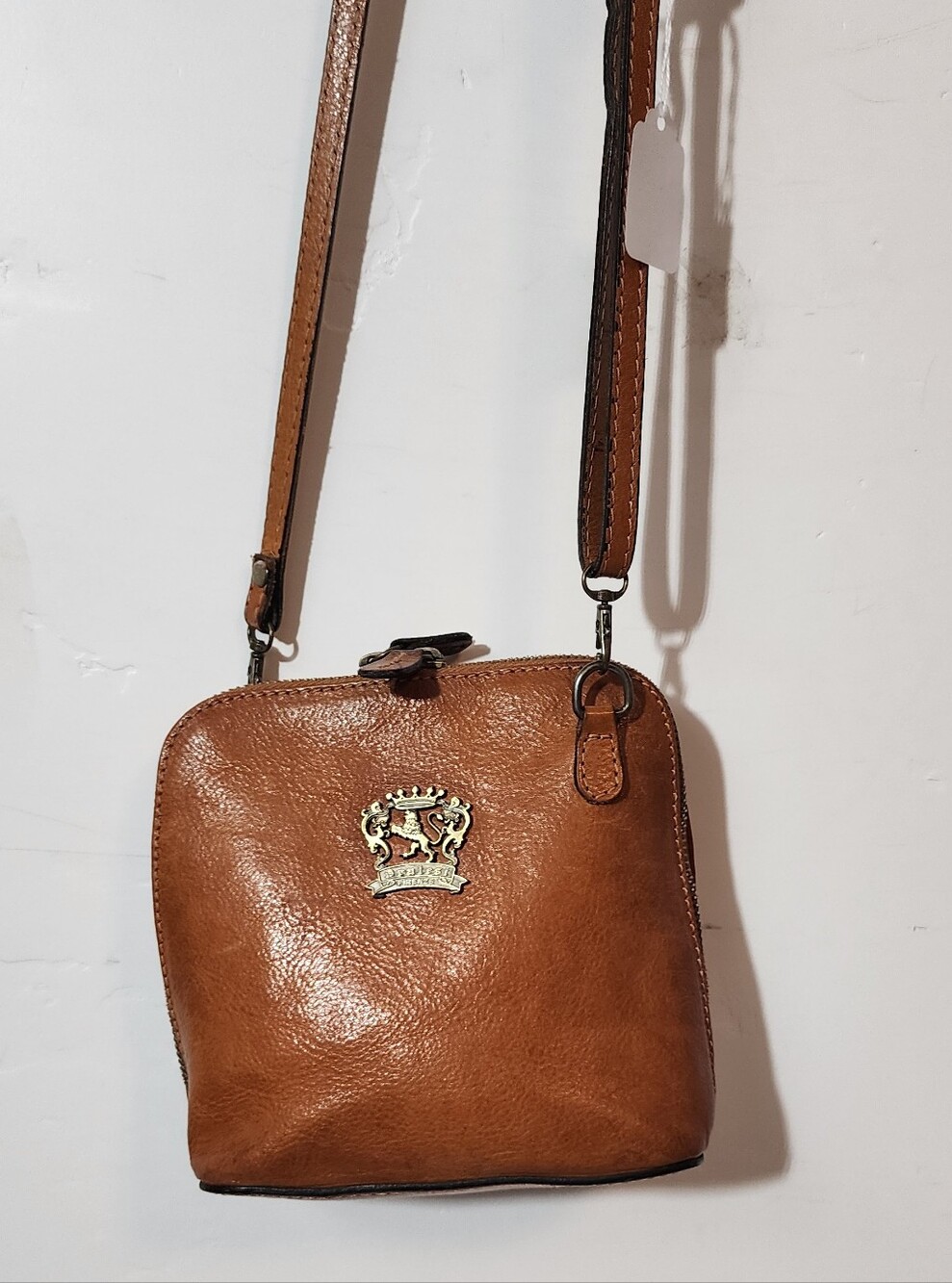 Tan Leather Crossbody Bag with Crest Detail
